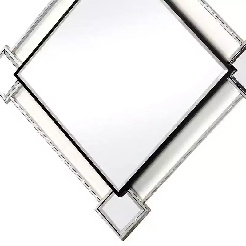 Miroir mural décoratif biseauté en forme de losange avec inserts de miroir, argenté
